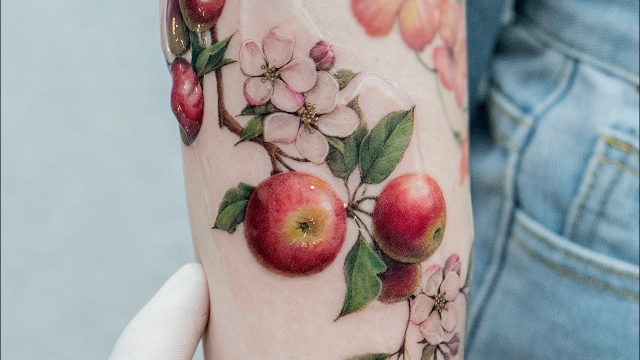 Apfel Logo Tattoo