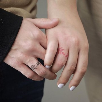 Minimalistische Ringe als Tattoos