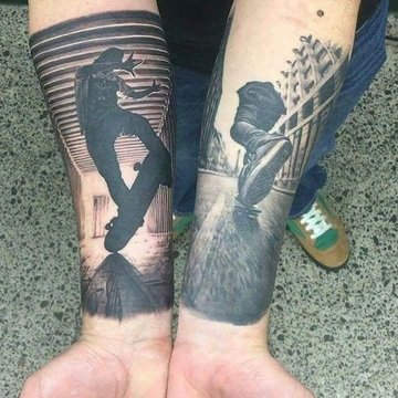 Skateboard-Tattoo auf dem Unterarm