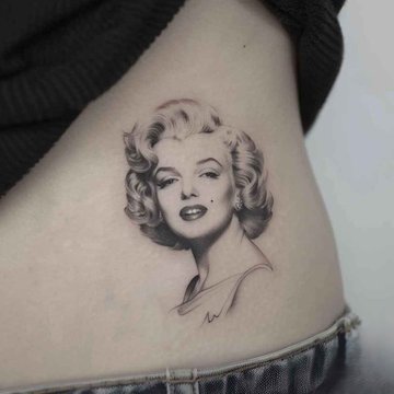 Feines Tattoo von Marilyn Monroe